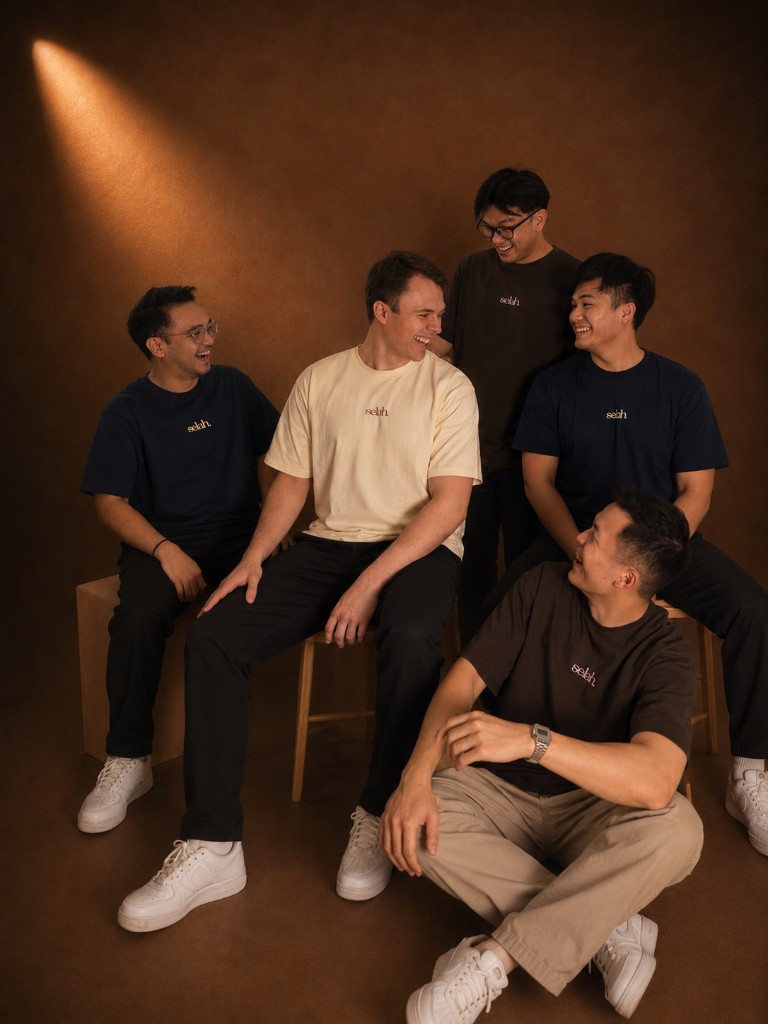 Group wearing the Selah tee collection